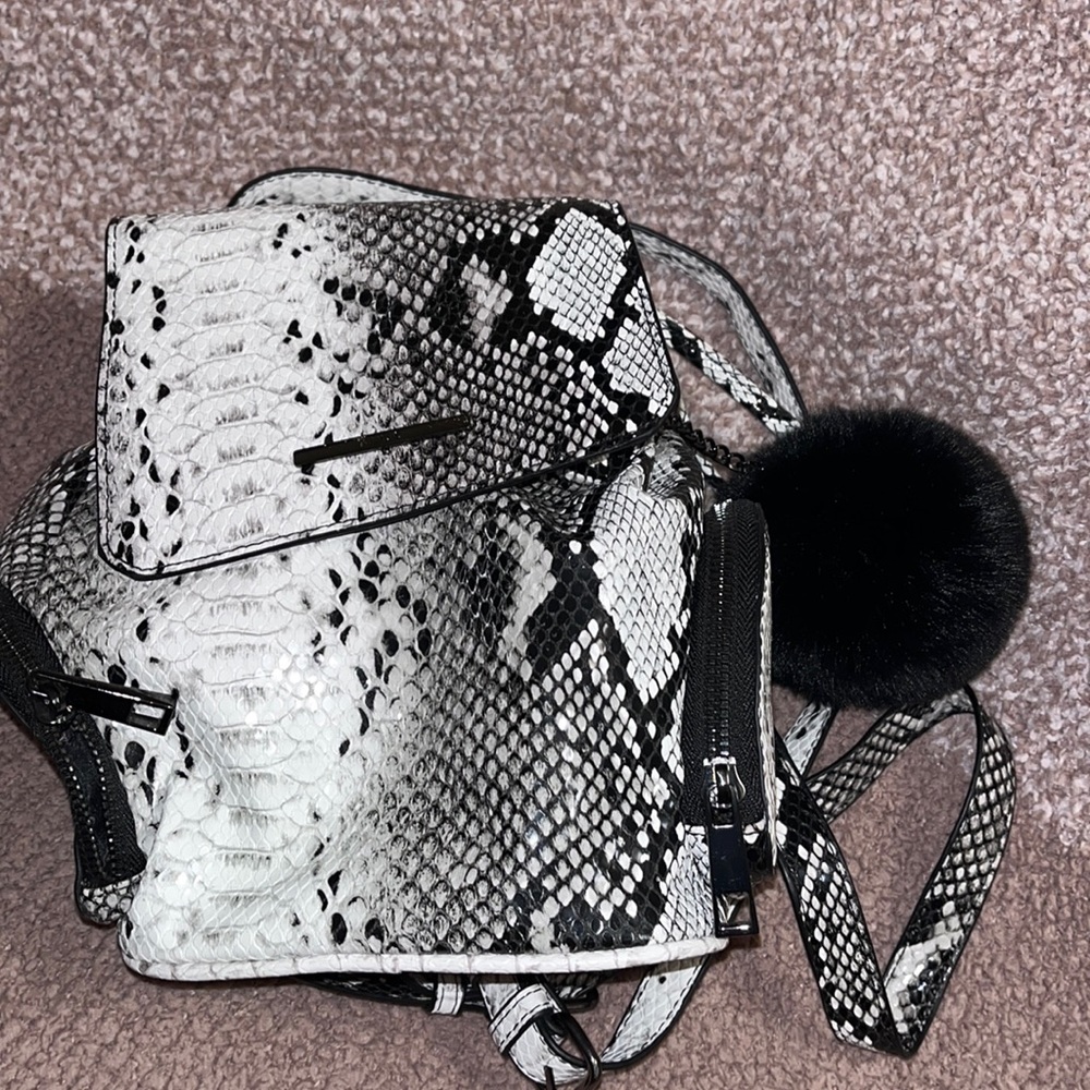 Cute Aldo snake skin small bookbag